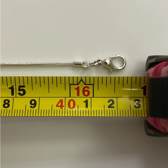 A Silver-Tone Simulated Polished Abalone and Rhinestone Kenneth Cole Necklace - Picture 9 of 10